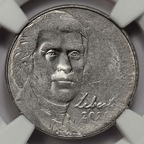 2020 nickel strike-through error showing foreign object impression void on coin surface